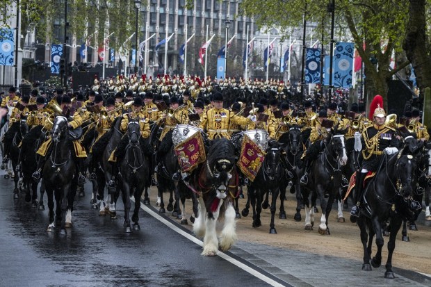 Band of the household cavalry make their way to Westminster Abbey prior to the coronation ceremony of Britain's King Charles III in London Saturday. (Photo: AP)