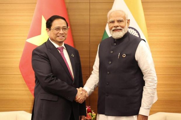PM Modi meeting with his Vietnamese counterpart PM Pham Minh Chinh during G7 Summit. (Image/Twitter)
