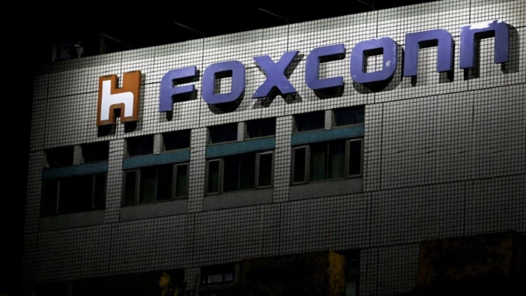 Foxconn, chip plant, STMicroelectronics NV, Vedanta Resources, semiconductor business, chip technology, financing plans, debt arrangements