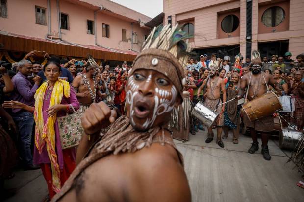 Hindu devotees perform a tribal dance outside the Jagannath temple in Ahmedabad. REUTERS