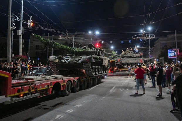 Fighters of Wagner private mercenary group pull out of the headquarters of the Southern Military District to return to base, in the city of Rostov-on-Don, Russia. (Reuters Photo)