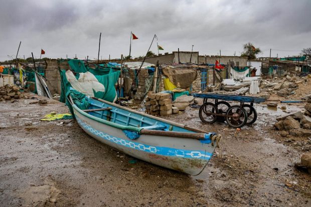 A fisherman colony wears a deserted look ahead of the landfall of Biparjoy cyclone, at Jakhau port in Kutch district. Additionally, the IMD on Tuesday issued an Orange alert for Saurashtra and Kutch coasts in Gujarat as the cyclonic storm Biparjoy is set to cross the Jakhau Port in Gujarat by the evening of June 15 as Very Severe Cyclonic Storm. (PTI Photo)