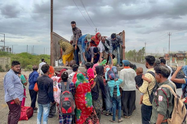 Villagers leave Jakhau village during evacuation ahead of cyclone Biparjoy’s landfall. The Gujarat government has picked up evacuation efforts with the aim to evacuate people within 10 km from the coast in view of the approaching very severe cyclonic storm. (PTI Photo)