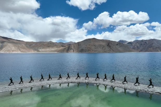 Indian Army personnel performs Yoga at the world's highest saltwater lake. (Photo Credits: ANI)