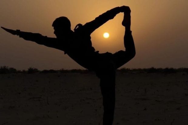 Indian Army personnel performs Yoga in Rajasthan on International Day of Yoga. (Photo Credits: ANI)