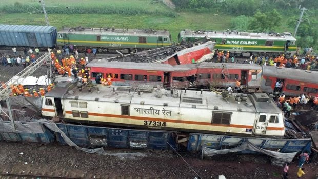 Balasore: Locals, security personnel and NDRF during the search and rescue operation at the site where Coromandel, Bengaluru-Howrah Express trains derailed last night, in Balasore district, Saturday, June 3, 2023. (PTI Photo) (PTI06_03_2023_000004B)