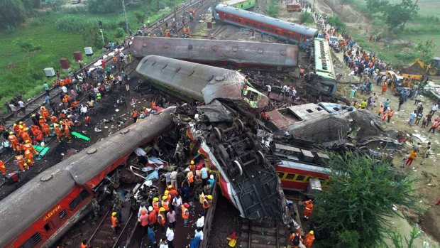 Balasore: Locals, security personnel and NDRF during the search and rescue operation at the site where Coromandel, Bengaluru-Howrah Express trains derailed last night, in Balasore district, Saturday, June 3, 2023. (PTI Photo) (PTI06_03_2023_000005A)