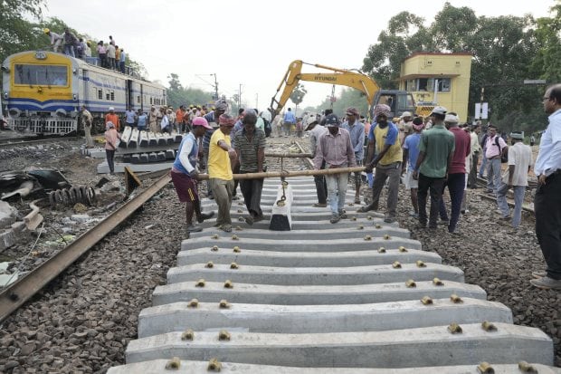 The crash involving Bengaluru-Howrah Superfast Express and Shalimar-Chennai Central Coromandel Express, which were carrying around 2,000 passengers, and a goods train occurred around 7 PM on Friday near the Bahanaga Bazar station in Balasore. (PTI Photo)