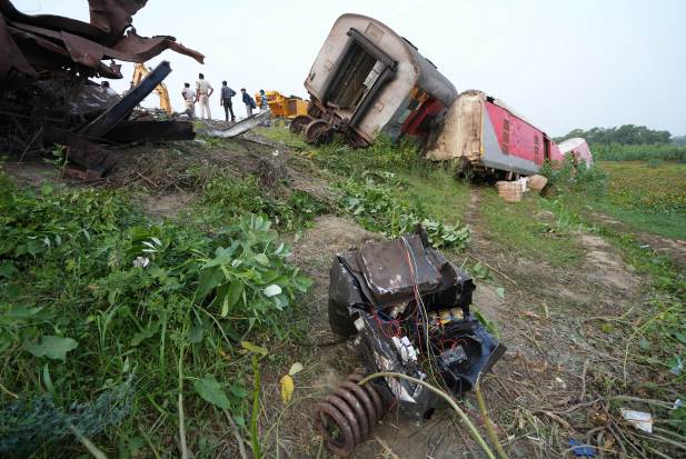 Indian Railways is working on a war footing to resume the services on Howrah-Chennai rail route. It has deployed more than 1000 workers, 7 Poclain Machines, 2 Accident Relief Trains, 3-4 Railway and Road Cranes for early restoration. (PTI Photo)