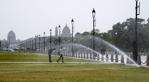 Delhi on Sunday witnessed a minimum temperature of 28.6 degrees Celsius, a notch above the season's average. The weather office has forecast a generally cloudy sky with light rain or thundershowers accompanied with gusty winds. (PTI photo)