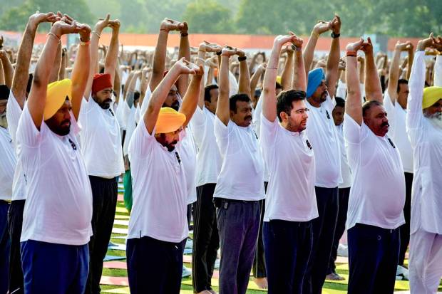 Jalandhar: Punjab Chief Minister Bhagwant Mann, AAP Rajya Sabha MP Raghav Chadda and others at the CM's yogshala, at the PAP grounds in Jalandhar. (PTI Photo)