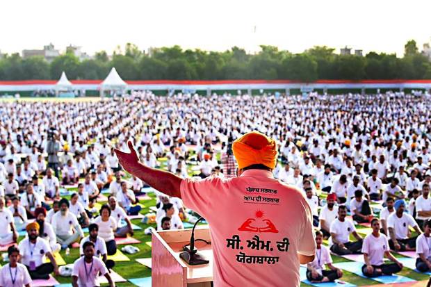 Jalandhar: Punjab Chief Minister Bhagwant Mann addresses the CM's yogshala, at the PAP grounds in Jalandhar. (PTI Photo)