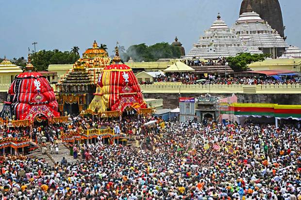 Puri: Devotees attend the Rath Yatra (chariot procession) of Lord Jagannath, his brother Balbhadra and sister Subhadra, in Puri. (PTI Photo)