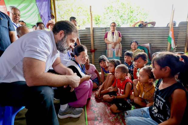 Moirang: Congress leader Rahul Gandhi interacts with children as he meets violence affected people at a relief camp in Moirang, Manipur. (PTI Photo)