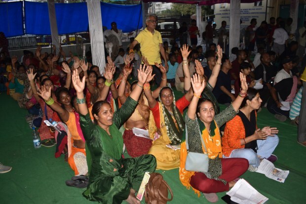  Pilgrims wait for registration at Mahajan hall in Jammu. (Image: PTI)