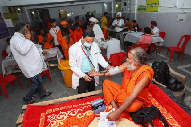 A sadhu being examined by the paramedical staff at Ram Mandir Amarnath Yatra base camp, in Jammu on June 30. (Image: PTI)
