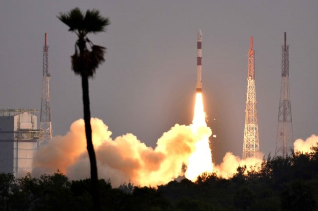 PSLV-C56 carrying Singapore’s DS-SAR satellite along with 6 co-passenger satellites lifts off from the launch pad. (Image: PTI)