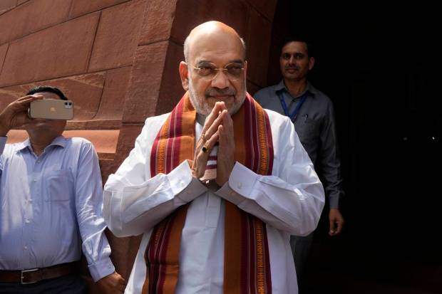 Indian Home Minister Amit Shah arrives on the opening day of the monsoon session of the Indian parliament, in New Delhi. (AP Photo)