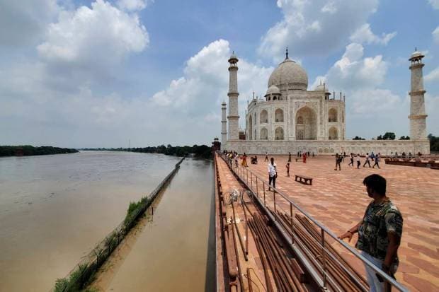 The swollen Yamuna river rises to the periphery of the Taj Mahal, in Agra. (AP Photo)