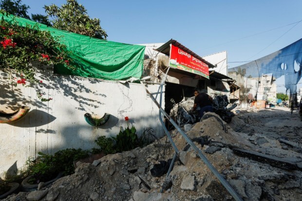 A view of a street dug up by a bulldozer during an Israeli military operation. (Image: Reuters)