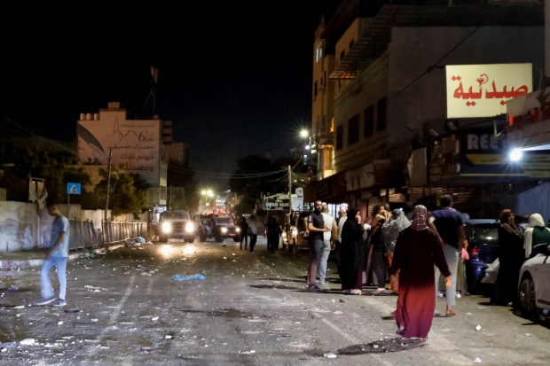 Residents of Jenin camp flee their homes amid an Israeli military operation. (Image: Reuters)