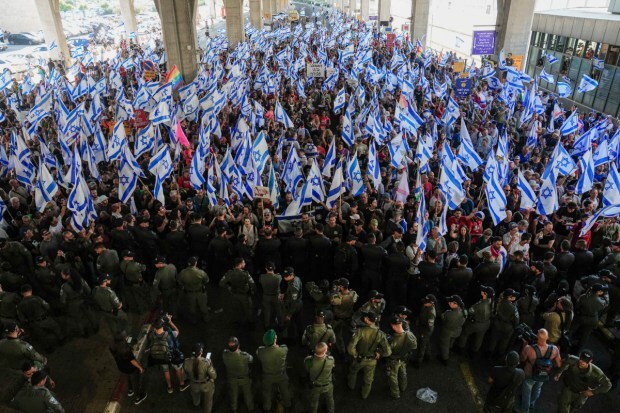 People carried out a protest outside the Ben-Gurion International Airport, however, police kept them from entering the terminal. (Image: AP)