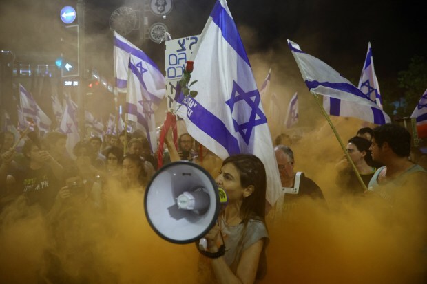 he protests led Netanyahu to suspend the overhaul in March. (Image: Reuters)