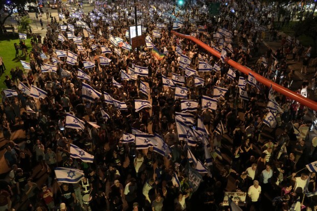 A protest also took place outside Netanyahu’s home in Jerusalem. (Image: AP)