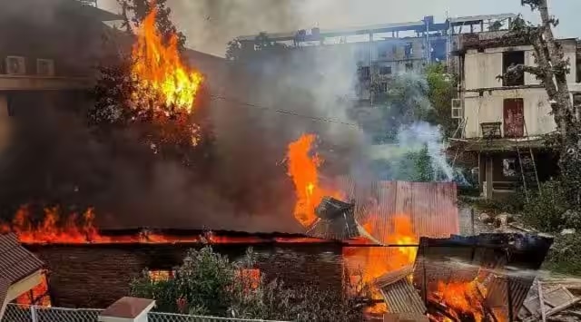 Manipur violence: Mob torches houses, buses used by security forces Manipur violence: Mob torches houses, buses used by security forces