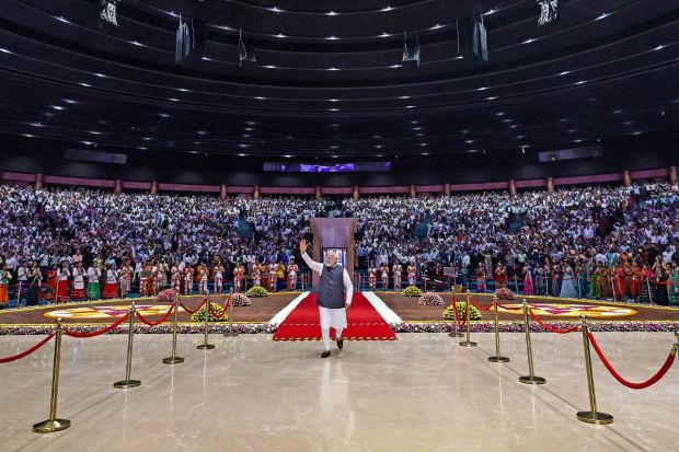 PM Modi acknowledges the crowd at the inauguration of the redeveloped International Exhibition-cum-Convention Centre (IECC) complex at Pragati Maidan. The Prime Minister also felicitated the Shramjeevis at the ITPO complex in New Delhi. (Photo Credits: PTI)