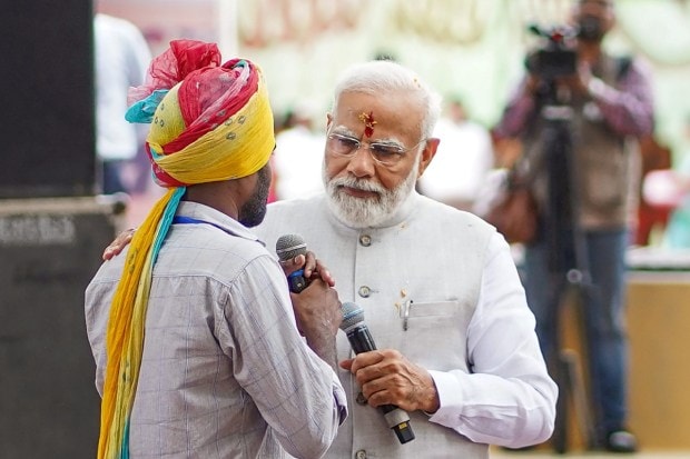 PM Modi walked amongst the audience during his interaction. (Image: PTI)