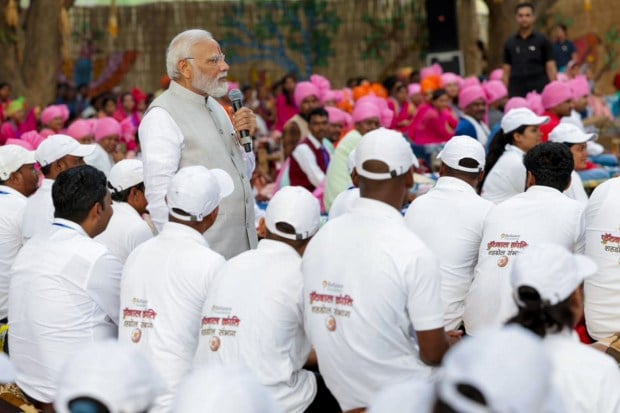 PM Modi lauded the participation of the tribal community members in India's growth. (Image: PTI)