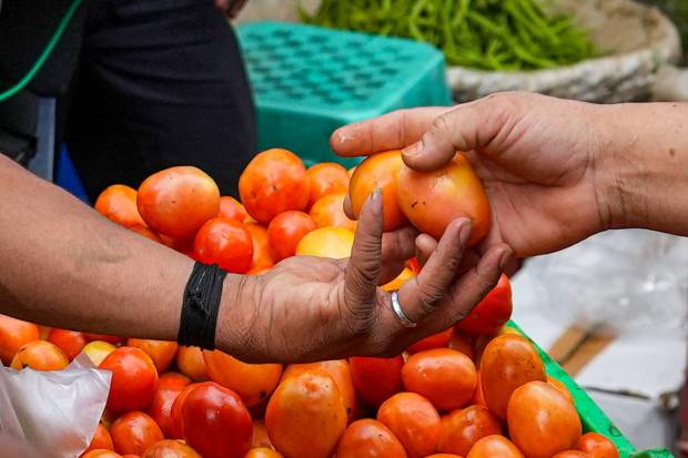 Tomatoes being sold at a market, in New Delhi. (PTI)