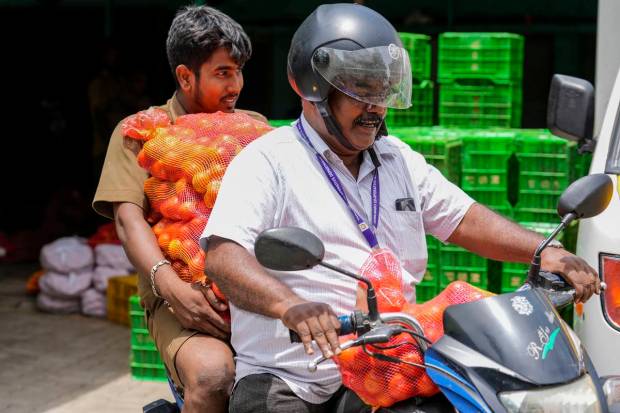 Tomatoes being dispatched from a Pannai Pasumai outlet to fair price shops, in Chennai, Tamil Nadu. (PTI)