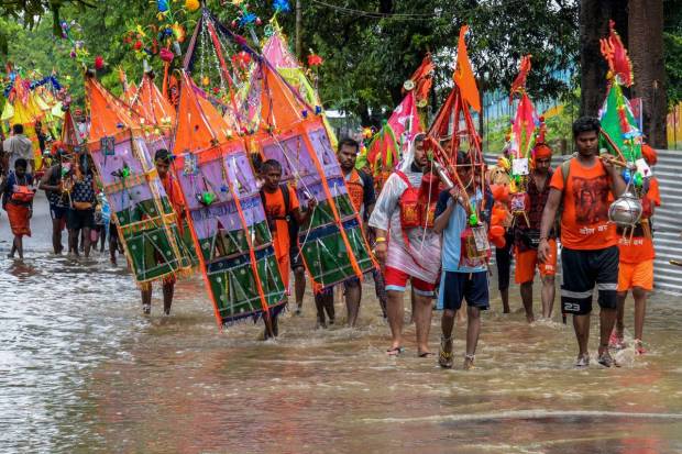 Lord Shiva devotees or Kanwariyas during the 'Kanwar Yatra' pilgrimage in the holy month of 'Shravan', in Haridwar. (PTI Photo)