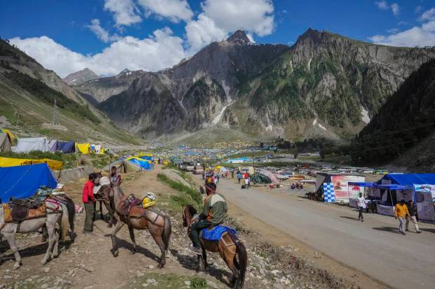 Baltal: Pilgrims at the Amarnath Yatra 2023 base camp in Baltal. (PTI Photo)