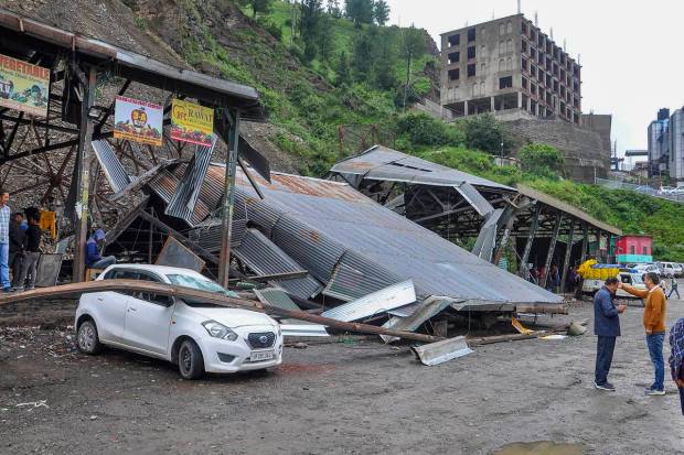 Damaged sheds of the Bhattakufer apple market after a landslide due to heavy monsoon rainfall, in Shimla. (PTI Photo)