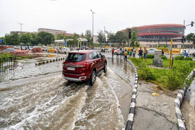 Waterlogged roads in front of the Supreme Court following rise in the water level of the Yamuna river, in New Delhi. (PTI Photo)