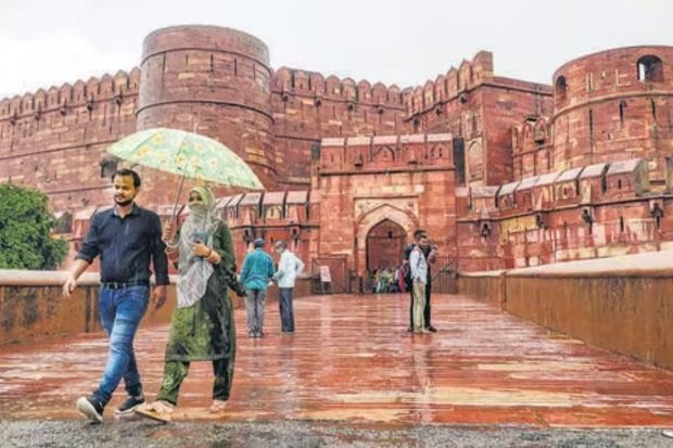 Red Fort looks absolutely stunning after getting washed from the rainfall, with lush green gardens, rain-washed roads, fresh and organic beauty all around the historic architecture. (Photo Credits: PTI)