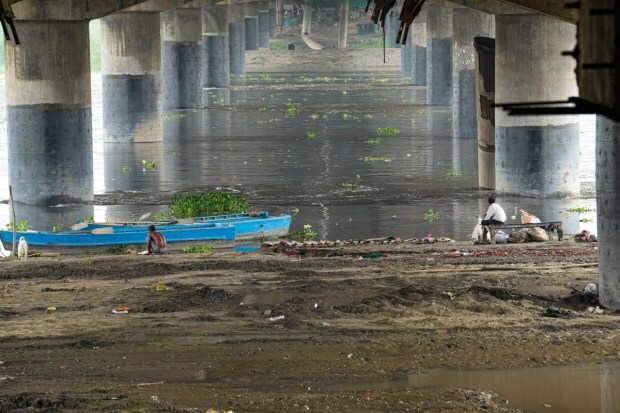  A boat anchored near the bank of Yamuna river on July 10. (Image: PTI)
