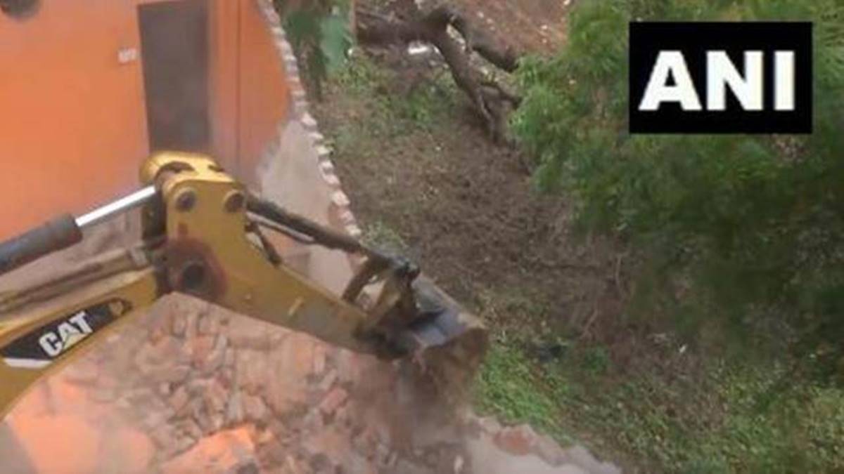 Madhya Pradesh, Sidhi, bulldozer Madhya Pradesh, Sidhi, bulldozer