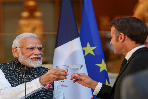 Prime Minister Narendra Modi with the French President Emmanuel Macron for a State Banquet at the Louvre Museum, in Paris on July 14, 2023. (Image: PTI Photo)