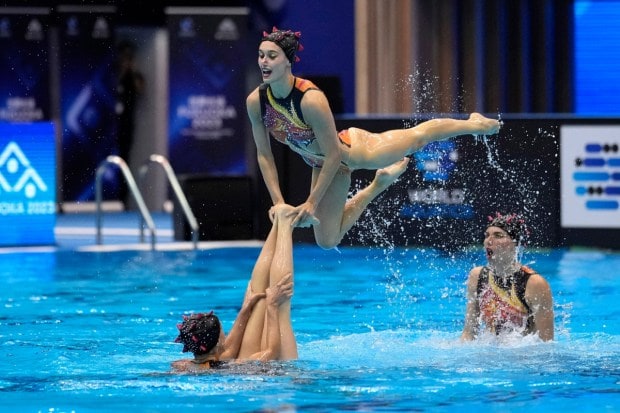 Italy team compete in the team acrobatic final of artistic swimming. (Image: AP)