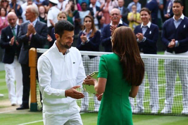 Djokovic receives the runners up trophy from Princess of Wales (Image: Reuters)