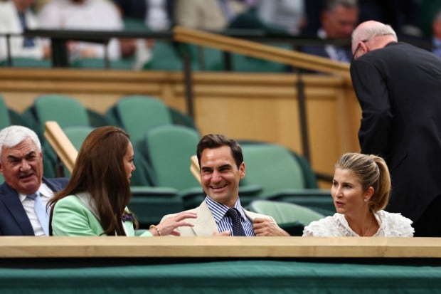 Federer sits alongside Kate, Princess of Wales and wife Mirka during the first round match between Shelby Rogers of the U.S. and Kazakhstan’s Elena Rybakina. (Image: Reuters)
