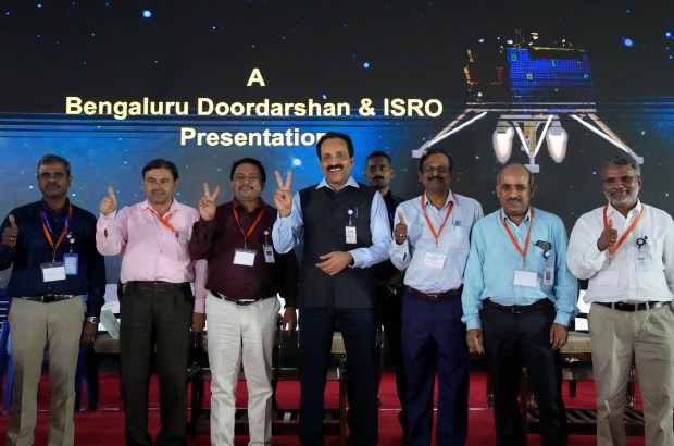 Indian Space Research Organization (ISRO) Chairman S. Somanath and his officers celebrate the successful landing of spacecraft Chandrayaan-3 on the moon at ISRO's Telemetry, Tracking and Command Network facility in Bengaluru. (Image/AP)