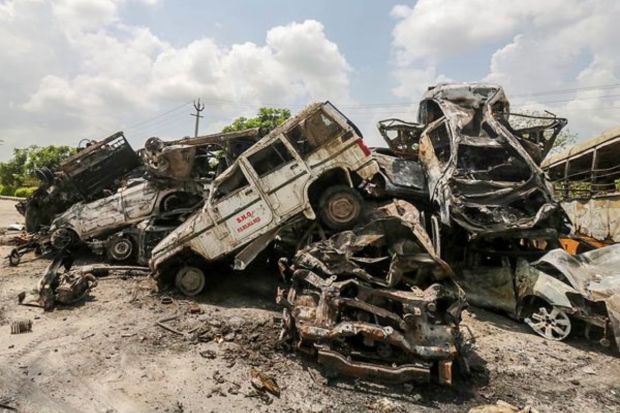 Wreckage of vehicles, including a Police vehicle, that were set on fire during communal clashes, in Nuh district on Tuesday. Six people died and many others injured in Nuh where mobs tried to stop a Vishva Hindu Parishad procession, while a naib imam was killed at a mosque in Gurugram. (Photo Credits: PTI)
