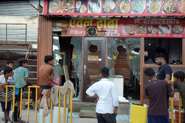 An eatery was vandalised by a mob following clashes between Hindu and Muslims that erupted on Monday, in Gurugram, on the outskirts of New Delhi. (Photo Credits: Reuters) 