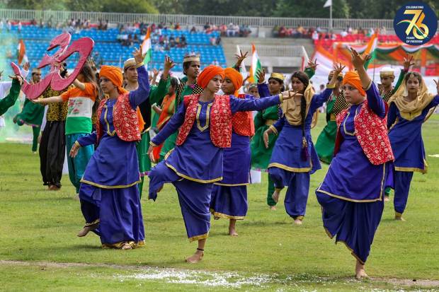 Students perform during celebrations of the 77th Independence Day, at Maulana Azad Stadium in Jammu (PTI Photo)