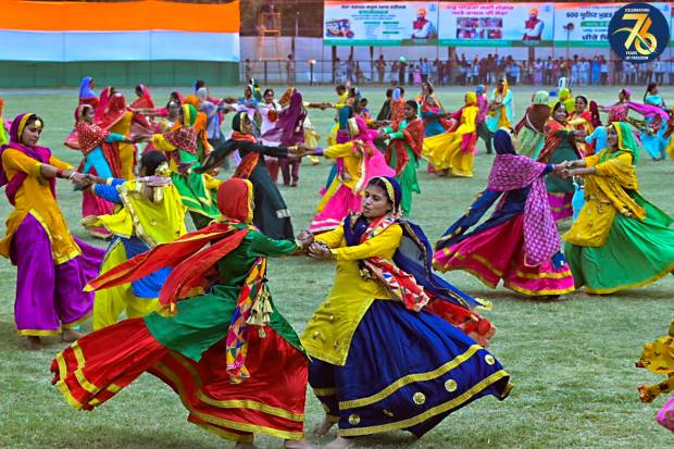 Artists perform Punjabi folk dance during celebrations of the 77th Independence Day, in Patiala. (PTI Photo)
